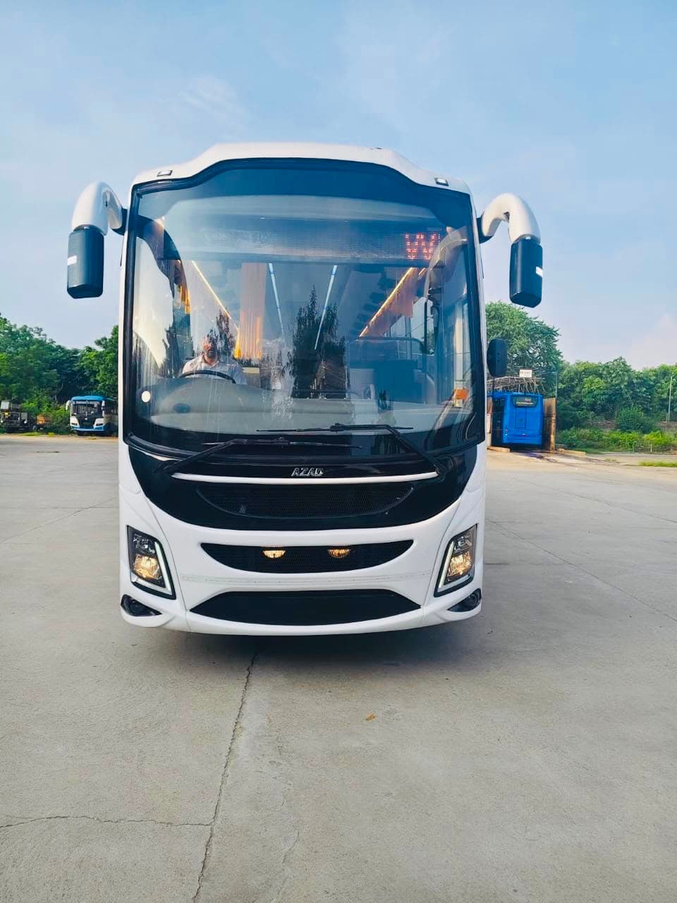 Qutbi Travels AC coach bus front view